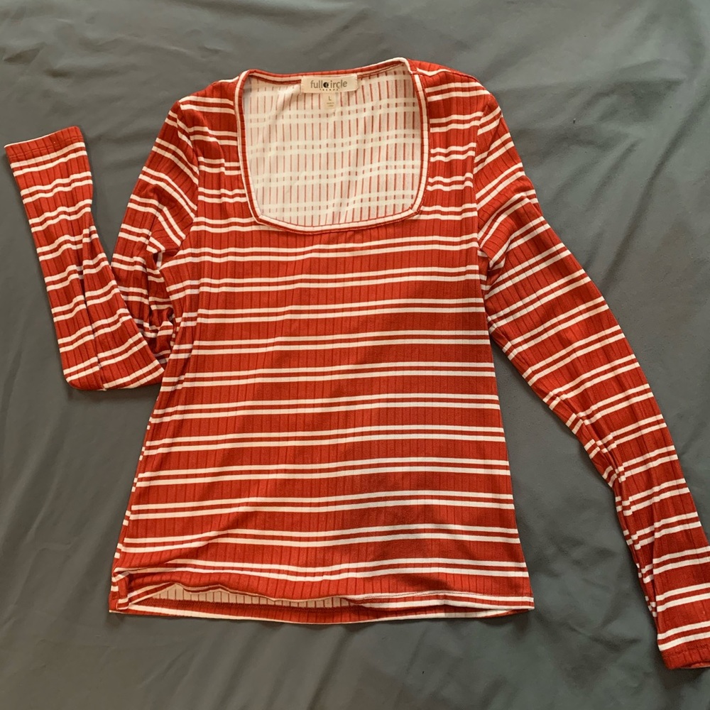Orange and white long sleeve top